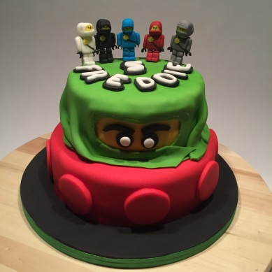 Lego inspired 2-tier cake with 5 sugar paste lego Ninjago figurines