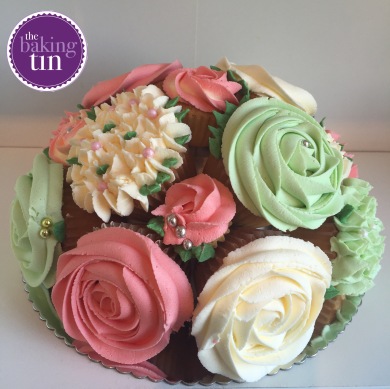 Salmon pink, cream and mint cupcake bouquet